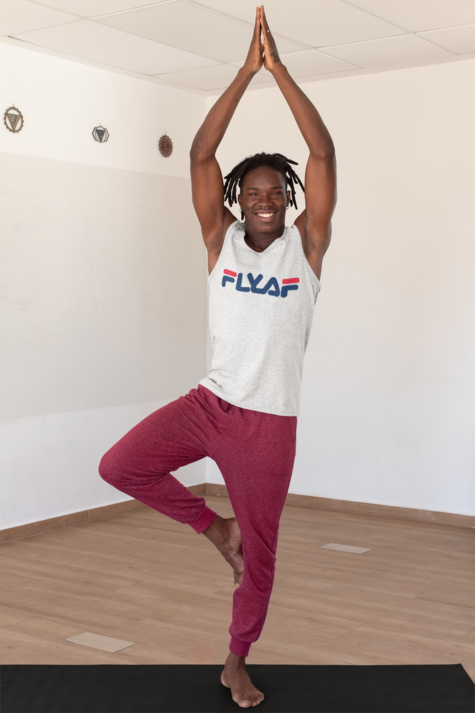 tall man doing yoga pose wearing a white Fly AF muscle shirt