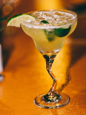 Margarita garnished with a lime wedge