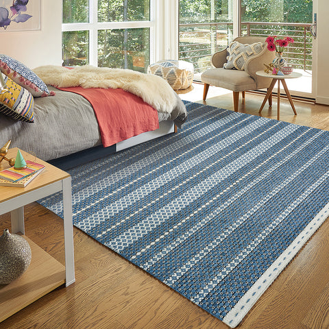 bedroom with flat woven rug