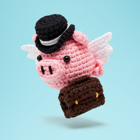 flying pig with briefcase and top hat