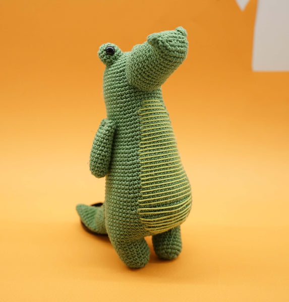 A crocheted crocodile.