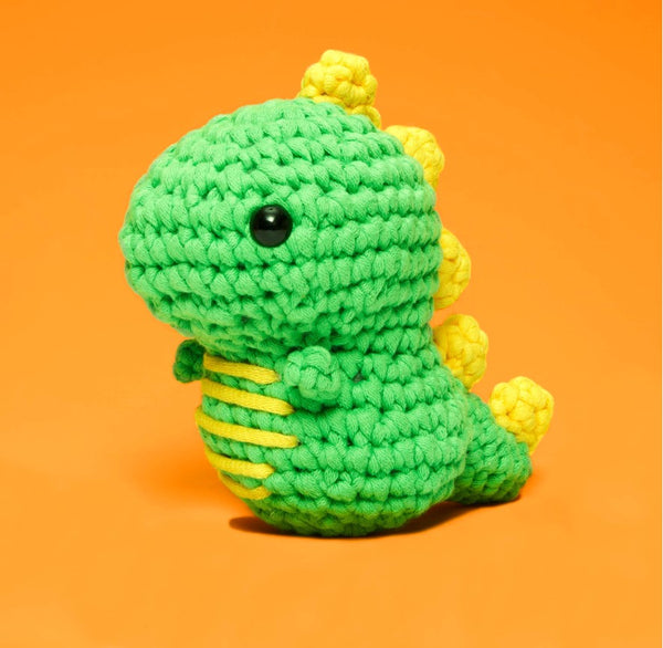 A crocheted dinosaur.