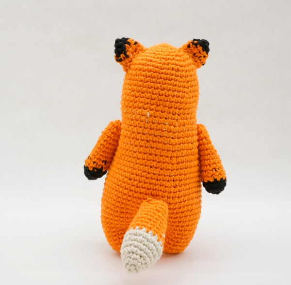 A crocheted fox’s tail.