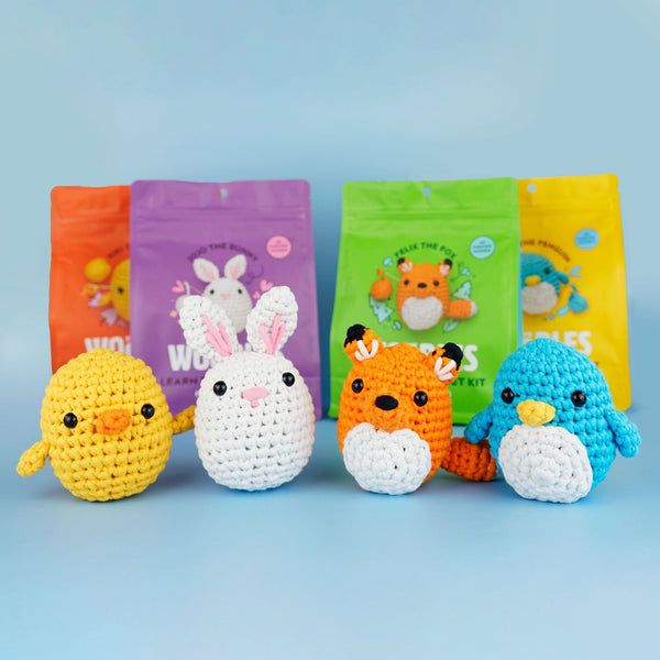 Kiki the Chick, Jojo the Bunny, Felix the Fox, and Pierre the Penguin with their respective packaging