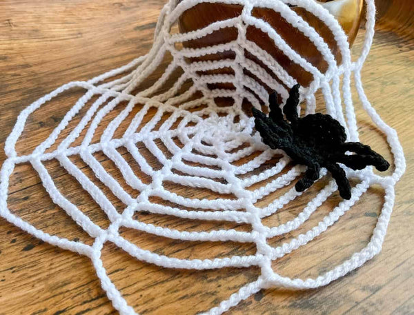 Crochet spider web with a spider attached