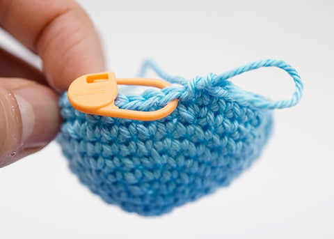 Stitch marker in round crocheted piece