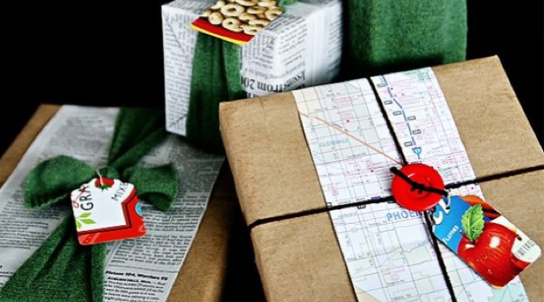 sustainable gift wrapping with magazine and maps
