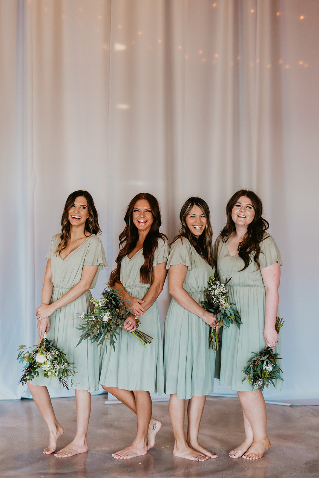 sage green midi bridesmaid dresses