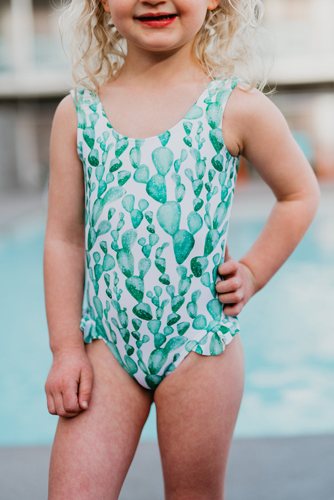 little girl in one piece swimsuit