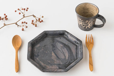 Black-glazed octagonal plate that is perfect for sashimi and sushi