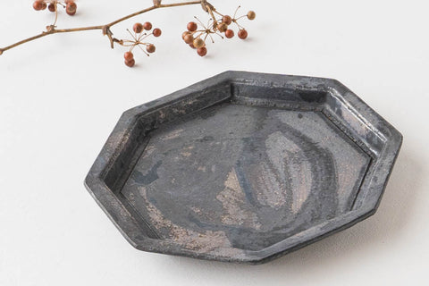 Nobufumi Watanabe's black-glazed octagonal dish that adds color to the dining table
