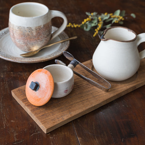 Naoko Ikemoto's clay pot chopstick rest that can also be used as a sugar bowl for tea time