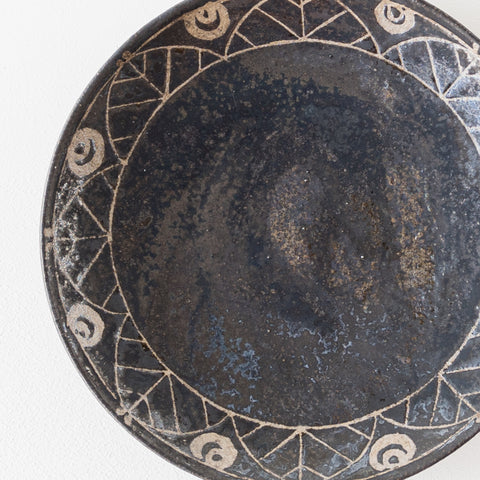 Nobufumi Watanabe's waxless 7-inch plate with a unique black glaze