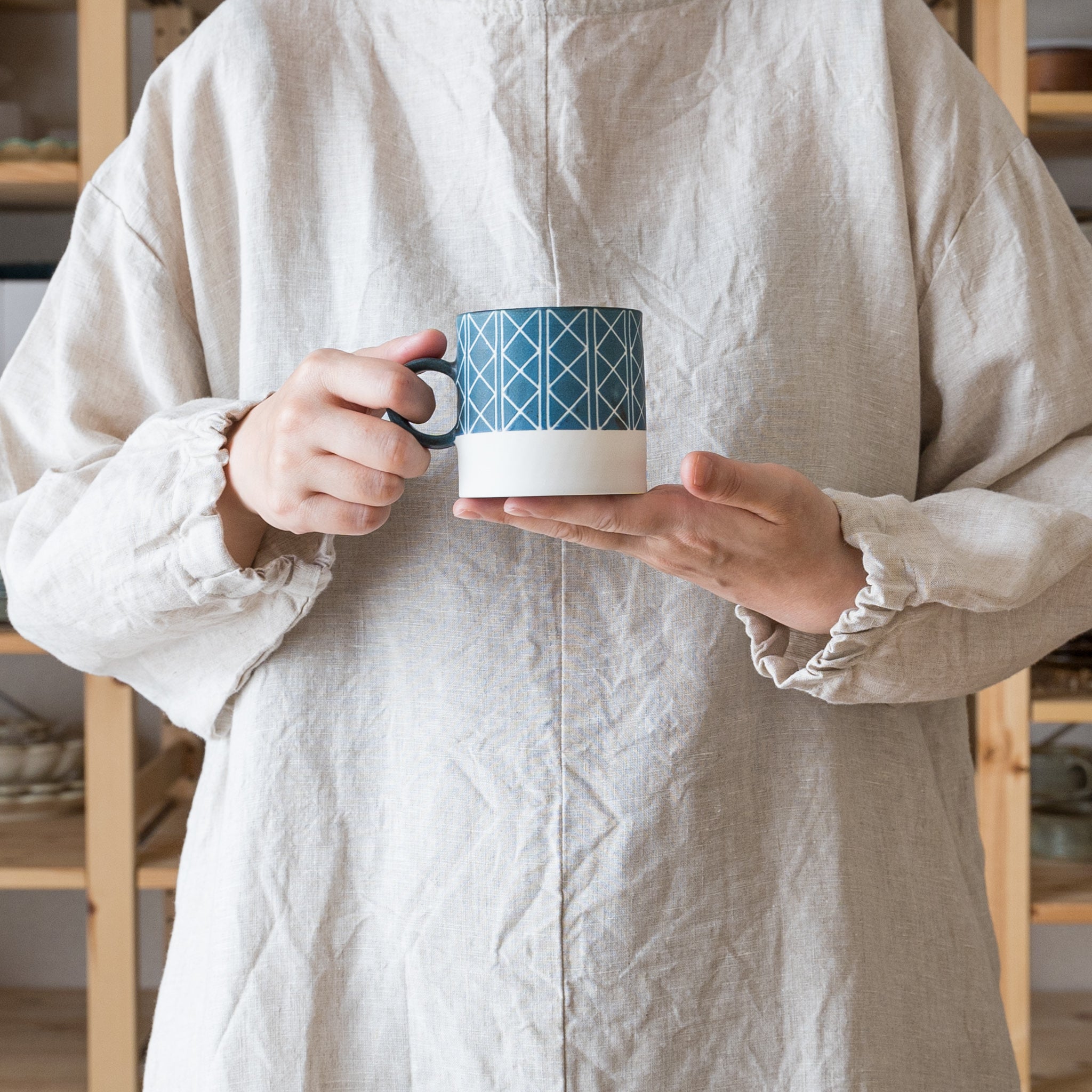 Yukari Nakagawa's stylish mug with geometric patterns and soft blue