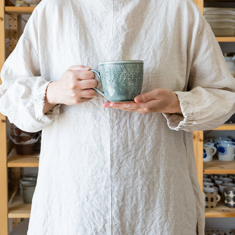 Wakasama pottery French lace mug that fits comfortably in your hand and is easy to hold
