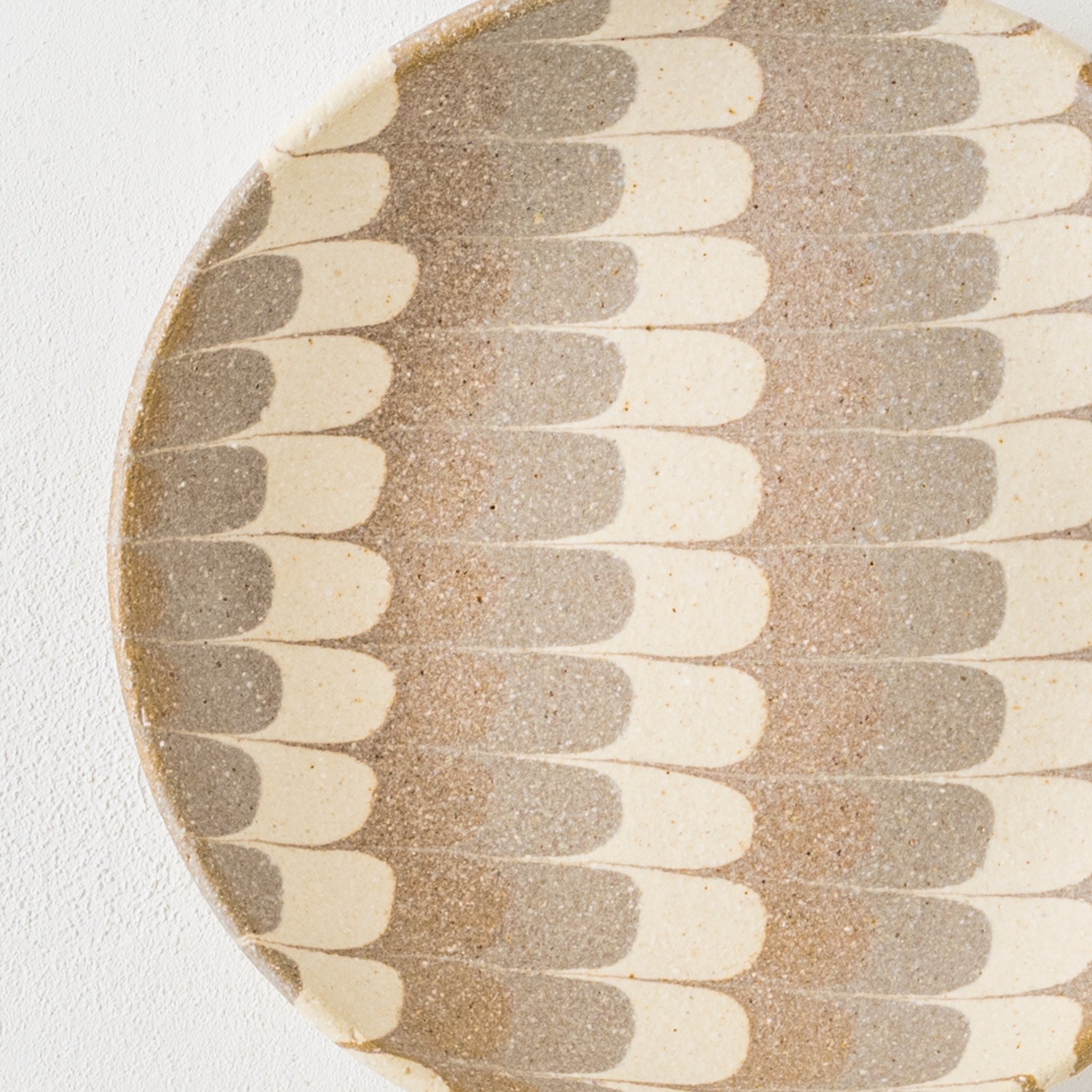 Hanako Sakashita's round plate with a warm quail pattern