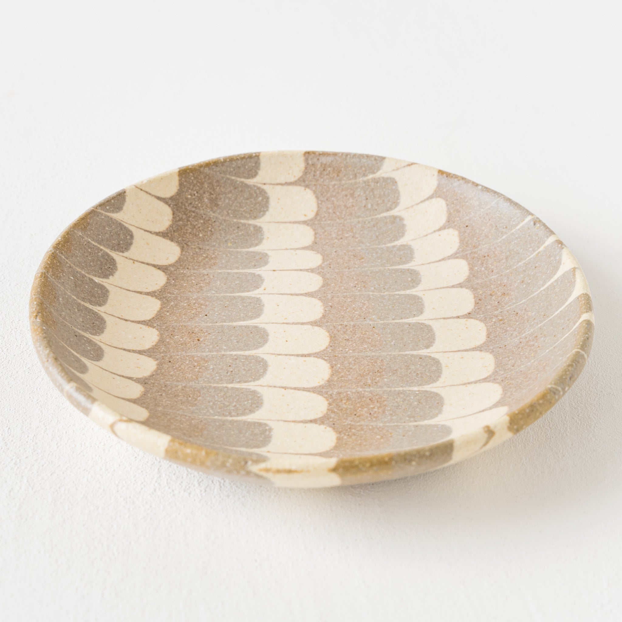 Hanako Sakashita's kneaded round plate with a wonderful quail pattern