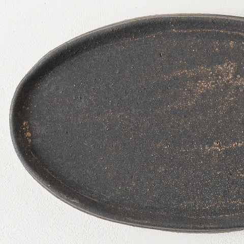 Iron glaze oval plate M by Sakiko Tomibe