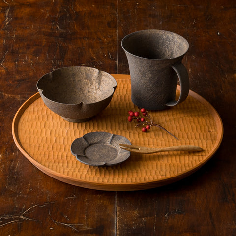 Iron-glazed vessels by Sakiko Tomibe