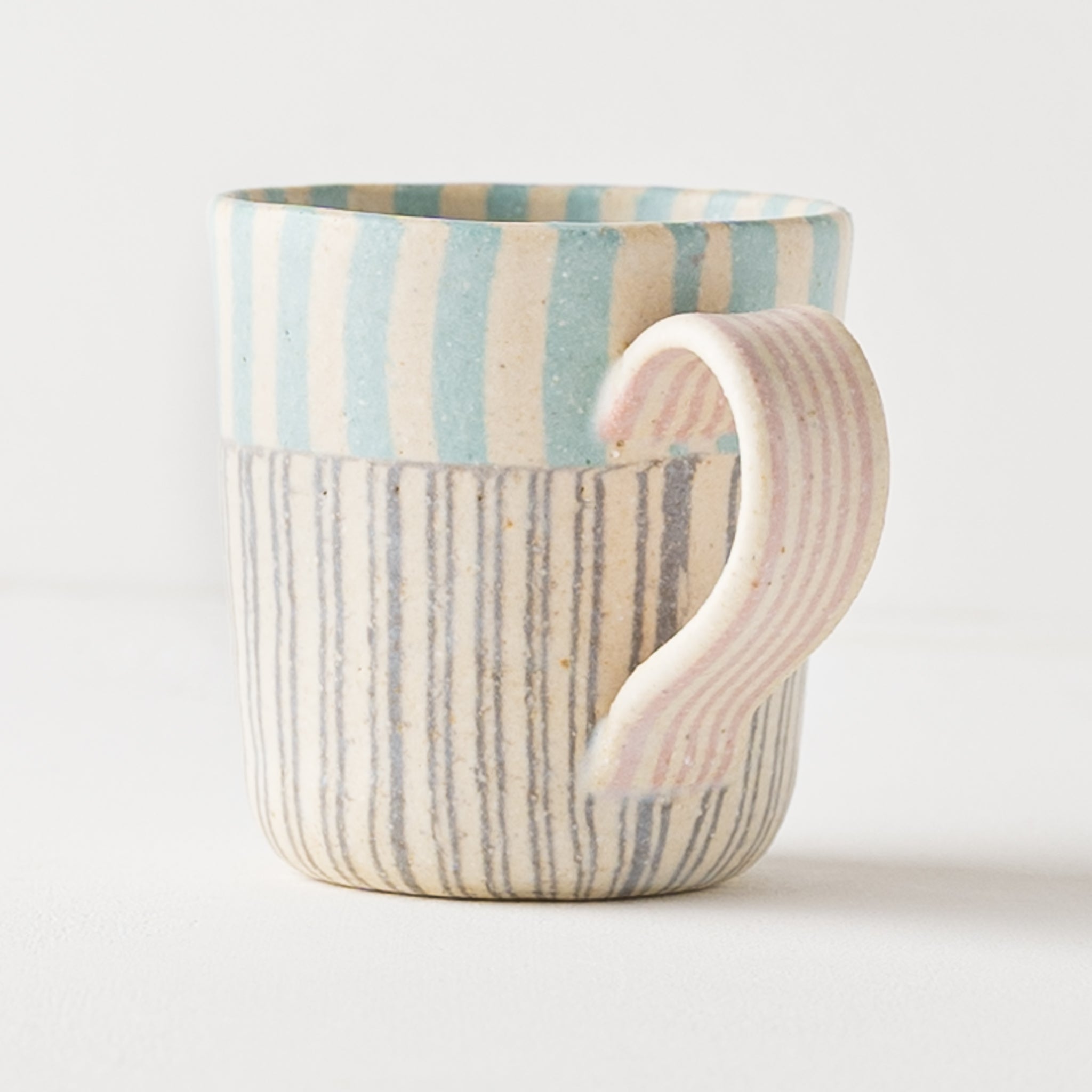 Hanako Sakashita's kneaded mug with gentle light blue and pink.