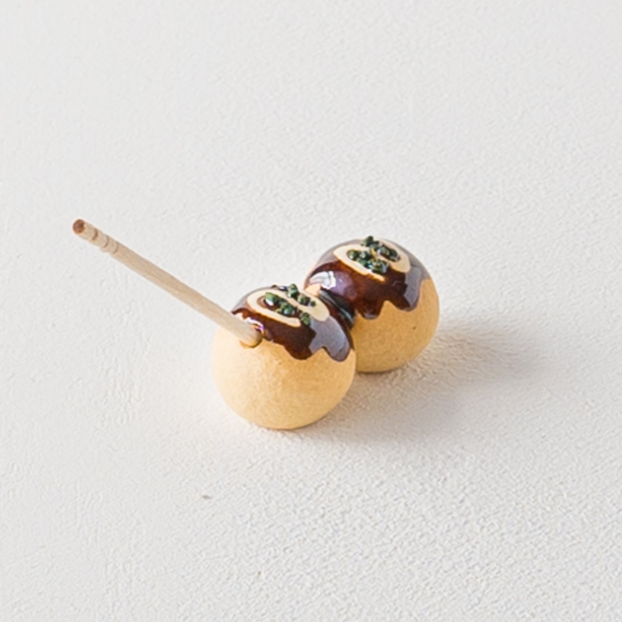 Ihoshiro kiln takoyaki chopstick rest with a toothpick