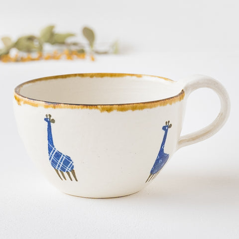 Yasumi Kobo's Japanese paper-dyed mug with a cute giraffe that makes you feel at ease.