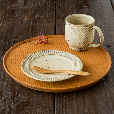 5-sun plate and herringbone mug from Kururi kiln