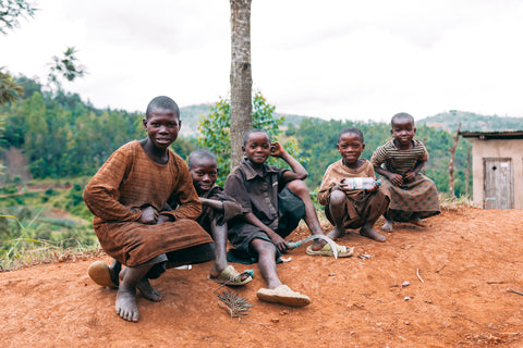 Rwandan children smiling at Vunga Cooperative