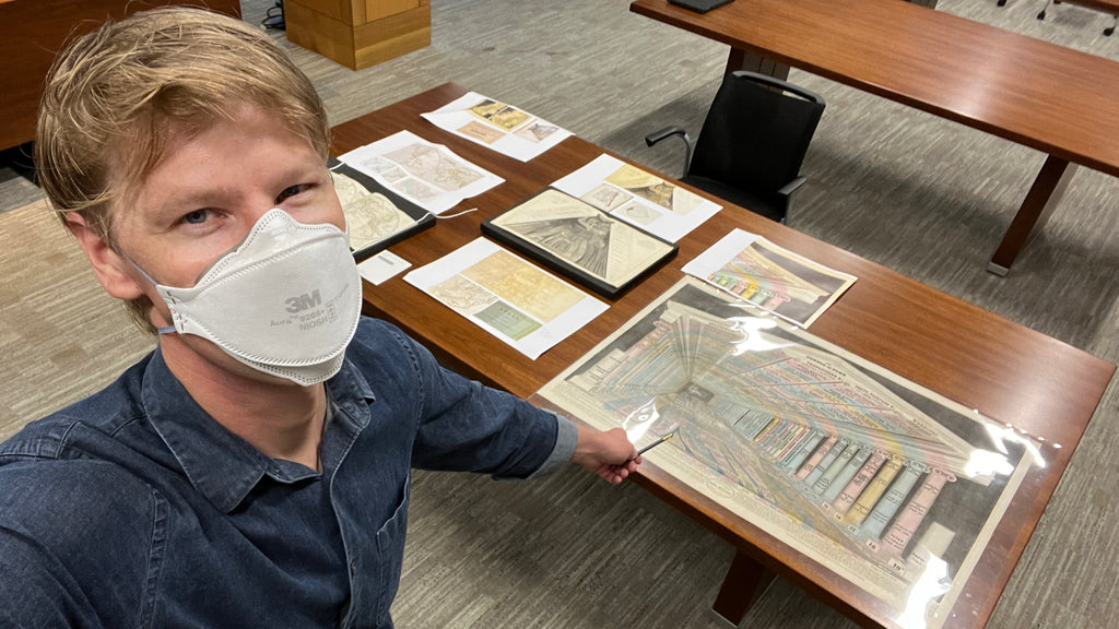 Series editor RJ Andrews comparing color proofs to original artifacts at the David Rumsey Map Center, Stanford University.