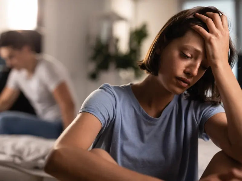 breakup best friends upset on couch