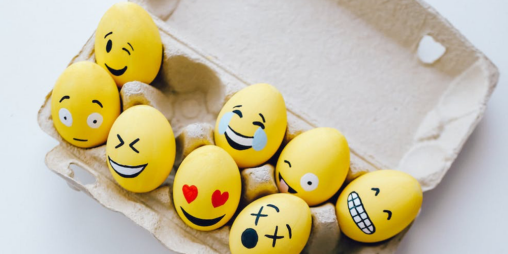 eggs painted with emoji emotions