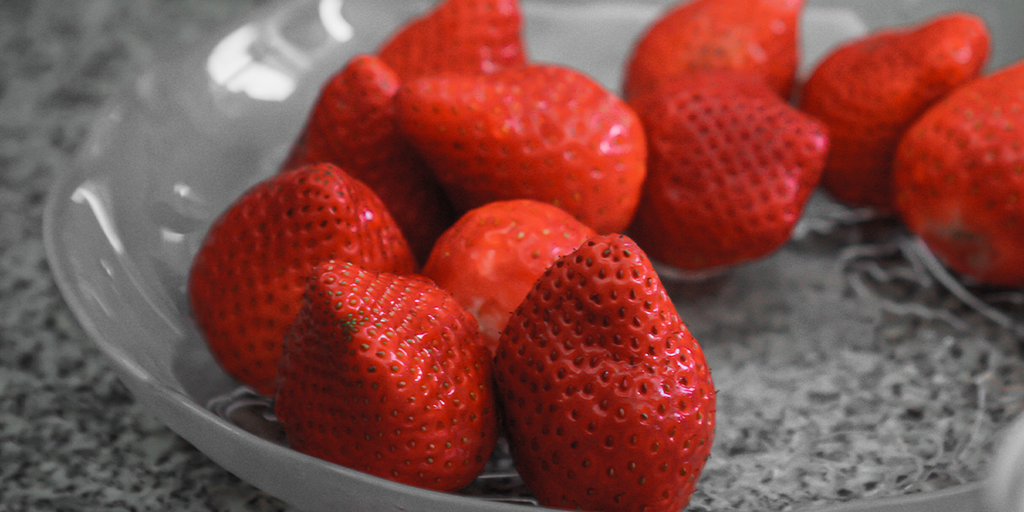 strawberries in a glass bowl