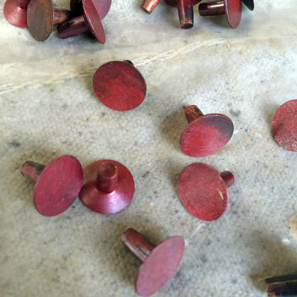 pink copper rivets after annealing