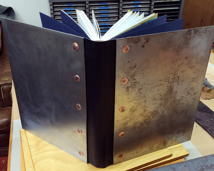 handmade book with steel covers