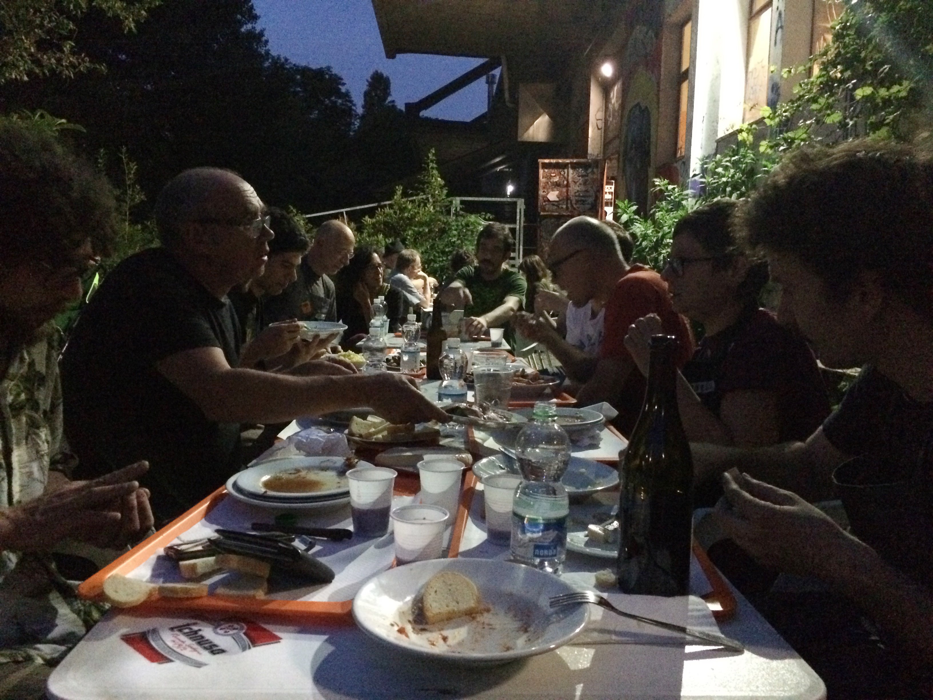 dinner in courtyard, evening, artists in Milan