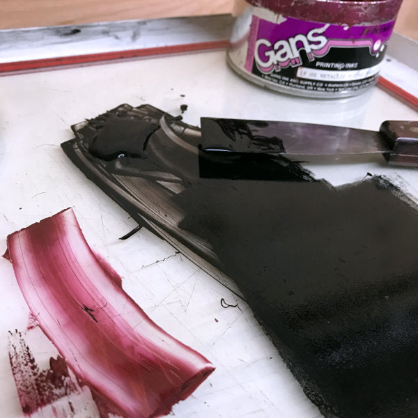 mixing ink, black and metallic purple