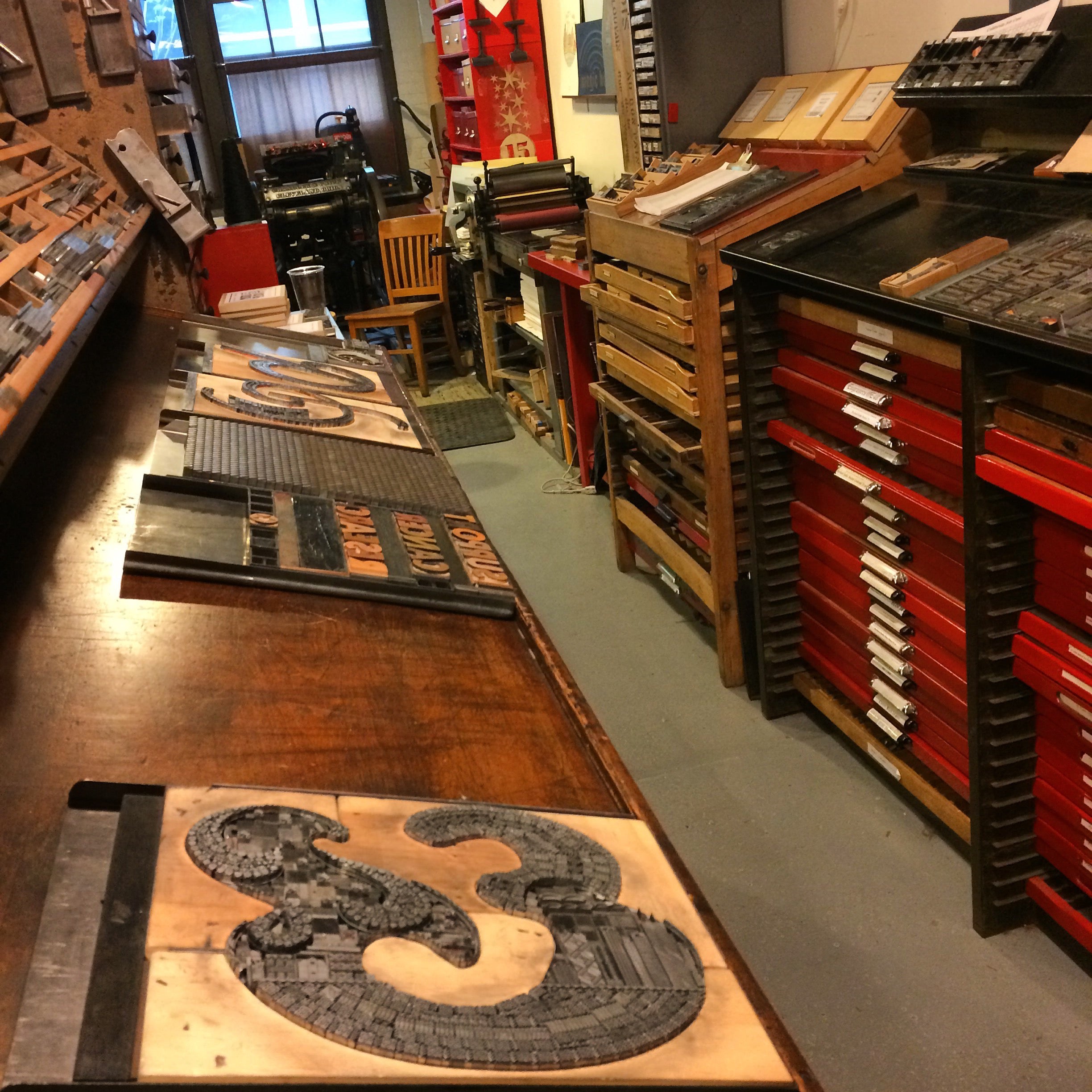view down one side of Starshaped Press printshop