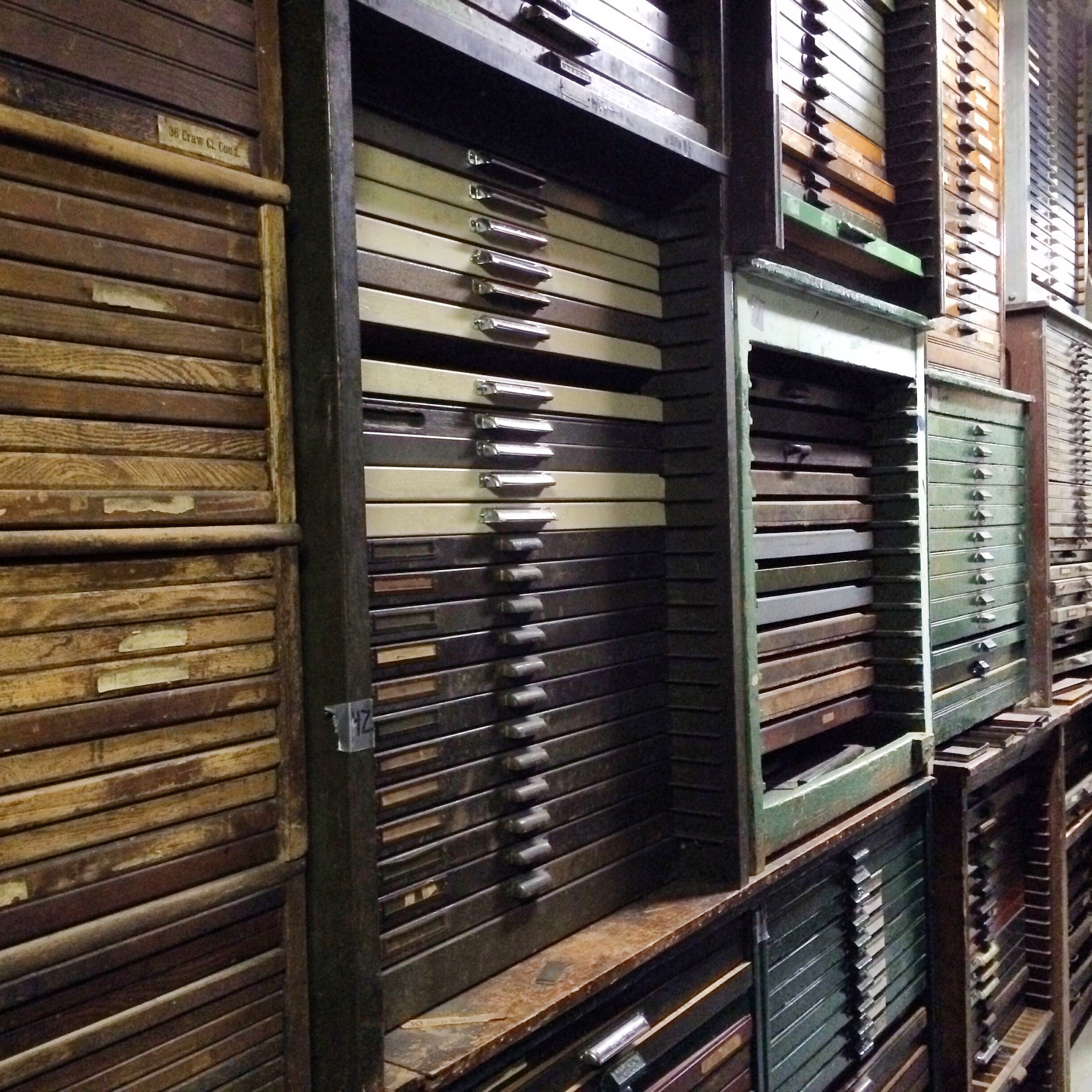 wall of type cabinets stacked three high