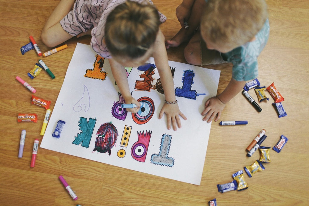 Kids coloring the monster font