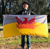 Designer Brian Stokle holds an early version of his San Francisco "Fog and Gold" flag