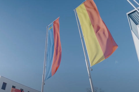 Leichtenstein's vertical banner with a banner of the princely house of Leichtentstein