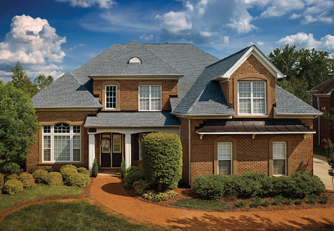 Brown brick house with Estate Grey shingle color