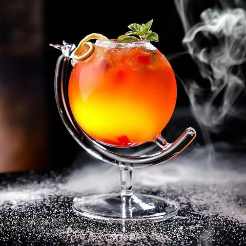 Caribbean Sunrise is a special cocktail that you can serve on Holi to unleash your inner party nerd! This cocktail looks incredibly appealing, especially when served in this unique globe cocktail glass.