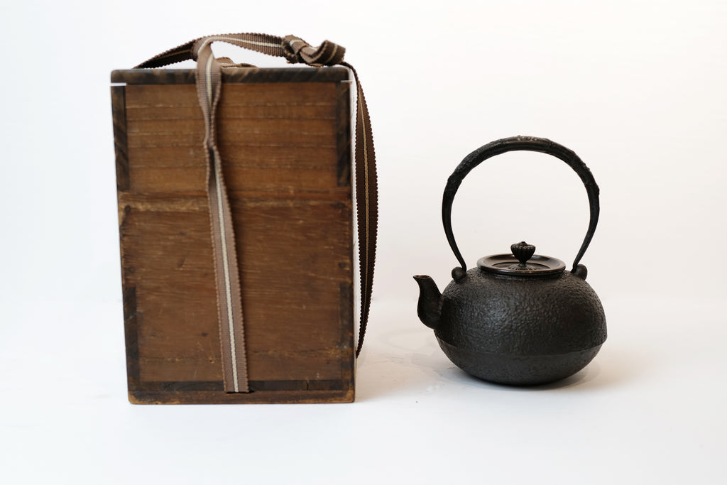 Silver Tea Kettle with Plum, Orchid, Bamboo, and Chrysanthemum 