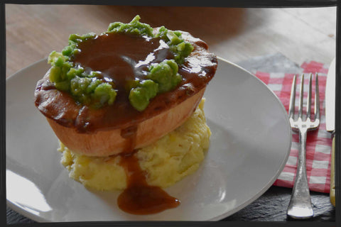 pie and mash served with mushy peas and gravy