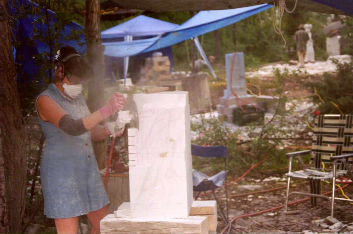 Kelly carving Against the Dying of the Light into Marble (never finished)