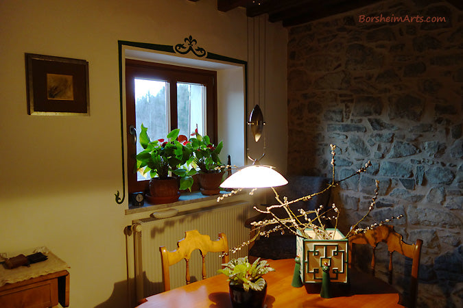 One of the rooms in a Tuscan home in which I painted a simple colorful design over the top and sides of the windows. This room received green.