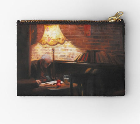 London Pub scene of man reading newspaper while enjoying a beer in a tavern alone on a zippered pouch art prints by Kelly Borsheim