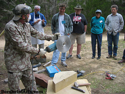 Vasily Fedorouk demonstrates the correct use of the diamond blade for cutting stone.