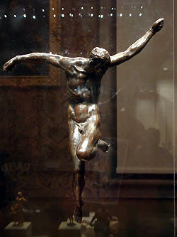 Bronze Crucifix with wavy arms Bardini Museum Florence Italy